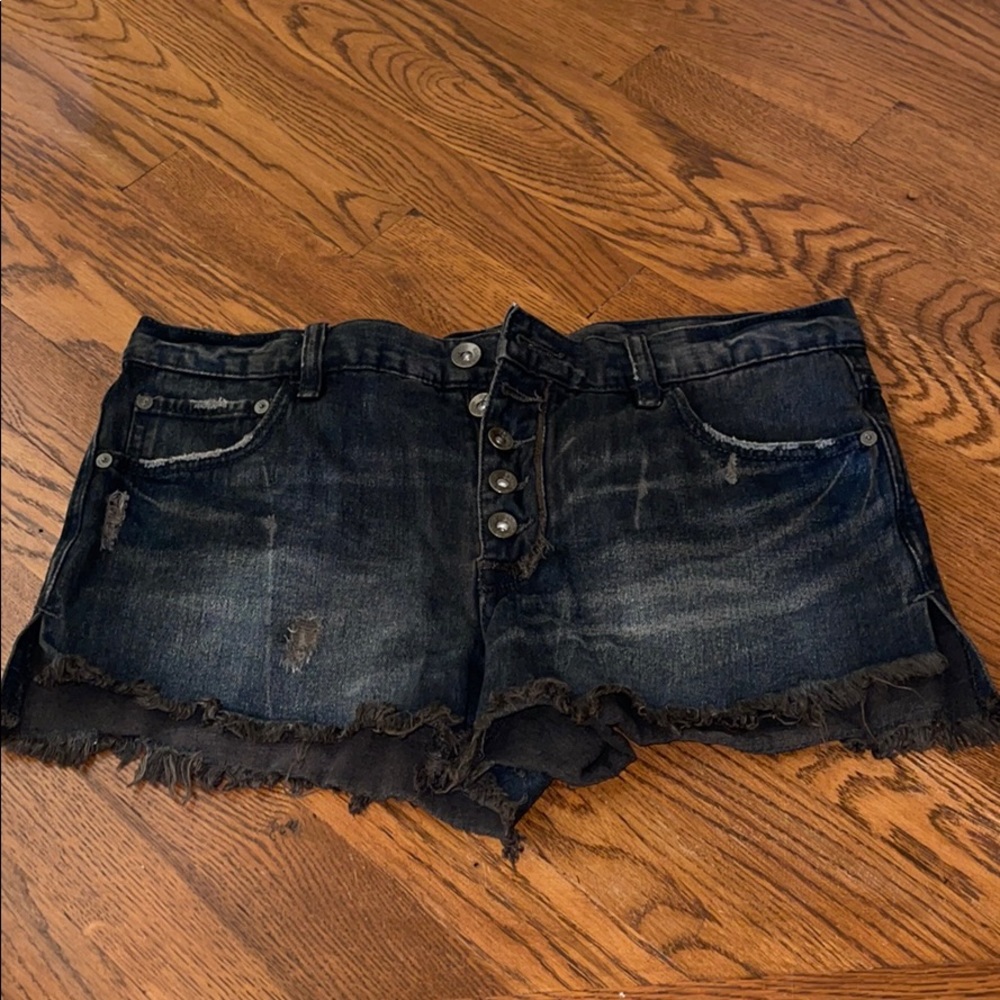 Free People black denim button fly shorts